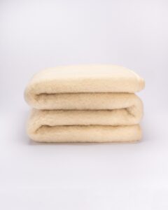 100% Merino vilnos lengva antklodė - pledukas WOOLLAND (vaikiška)