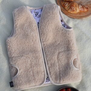 Vaikiška merino vilnos kreminė liemenė VORA, WoolLando